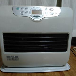 石油ファンヒーターと電動ポンプとタンク