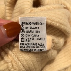 【SISLEY (MADE IN ITALY)】 ブランド中古 オフホワイトタートルセーターの画像