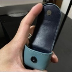 COACHのAirPodsケースの画像