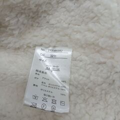 首があたたかそうなカーディガンの画像