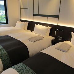 ホテルでのベッドメイキングスタッフ / Hotel house keeping staffの画像