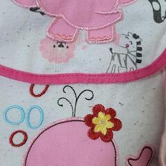 女の子用 よだけかけ10枚と靴下の画像