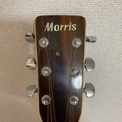 問い合わせが多いですので一時停止致しますアコステックギターと初心者用本の画像