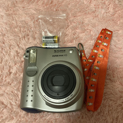 チェキ本体と新品電池の画像