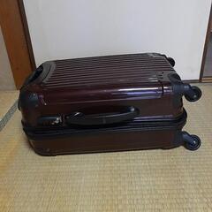 小さめのスーツケースあげますの画像