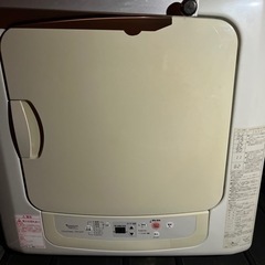 【お話し中】衣類乾燥機と台の画像