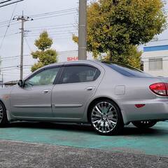 【総額５８万円】ニッサン　セフィーロ　エクシモ　ＮＡＶＩエディション　Ａ３３後期　４ＡＴ　グレイッシュシルバーＭ　3.2万K　車検整備付　 ＵＳＤＭ　Ｉ３５仕様１９インチレーベンハートメッキアルミ　ＵＳグリル　社外プロジェクターヘッドライト　ＵＳテール　インフィニティエンブレム　シートカバー　社外ＳＤフルセグナビ　ＣＤ　ＤＶＤ　ＵＳＢ　キーレスエントリー　イクリプスＳＤフルセグＴＶナビ　ローダウンの画像