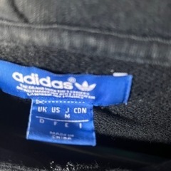 adidas アディダス プルオーバー パーカーの画像