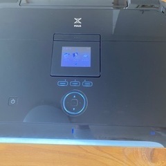 canonプリンターと新品インクカートリッジの画像