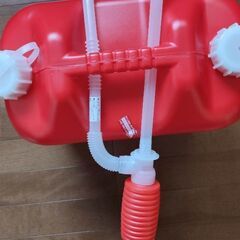 コロナ石油ファンヒーター、灯油ポリタンク、灯油ポンプの画像