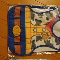 東京ディズニーリゾートウッディスタイなど赤ちゃんエプロン、未使用品の画像