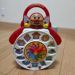 3点セット。　アンパンマン（キャリーバッグ・時計遊び）、積み木が乗る車の画像