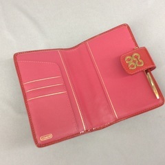 COACH コーチ 赤エナメルレザー オプアート 手帳カバーの画像