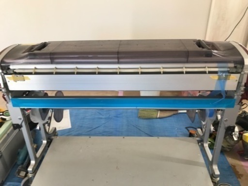 クロス糊付け機