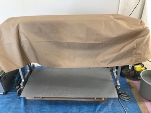 クロス糊付け機