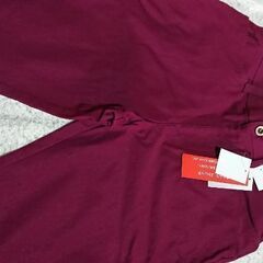 新品、タグ付き ワイン色 ストレッチ有り ブーツカット風パンツの画像