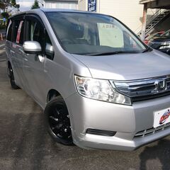 【金利０円・自社ローン】ステップワゴン Ｇ（電動サイドリフトアップシート車） フリップダウンモニター　ＥＴＣ　ＨＤＤナビ　両側電動スライドドア　オートライト　後席モニター　ＤＶＤ再生　ＣＤ　キーレスエントリー　アイドリングストップ　ＣＶＴ　記録簿　エアコン　パワーステアリングの画像