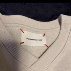 トップス Vネックスウェットの画像