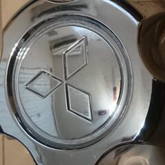 パジェロミニ センターホイールキャップ １台分 四個 メッキ 使用に伴う汚れ有り の画像