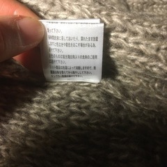ニットベスト　編み込み　茶　の画像
