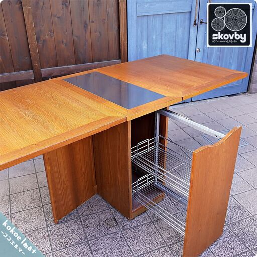 北欧デンマークのSkovby(スコビー)よりチーク材 SM101 マルチパーパステーブルです。モダンなデザインの2人から6人用バタフライ式の伸長式ダイニングテーブル。シンプルでスマートな多機能テーブルCA310