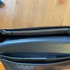 COACH二つ折り長財布の画像
