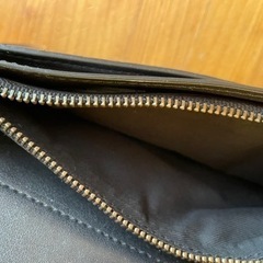 COACH二つ折り長財布の画像
