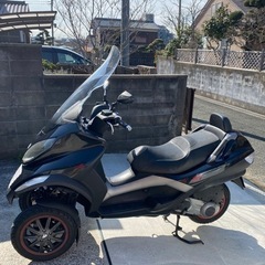 なかなか出ません！普通車免許で乗れます！ピアジオMP3  エンジンはかかりますが要修理の画像