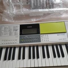 新品近い おまけ付きCASIO 光ナビゲーションキーボードの画像