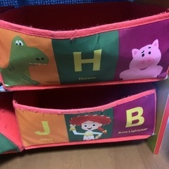 トイストーリー トイザらス限定 おもちゃ箱の画像