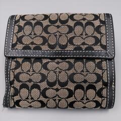 COACH・シグネチャー折り財布の画像