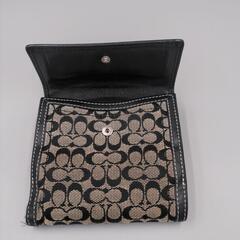 COACH・シグネチャー折り財布の画像