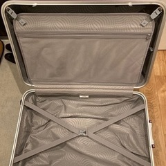 【取引中】スーツケース(サムソナイト91ℓ・紫・車輪1つ破損)の画像