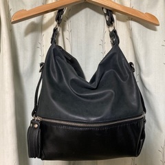 コート、カバン、トップスの画像