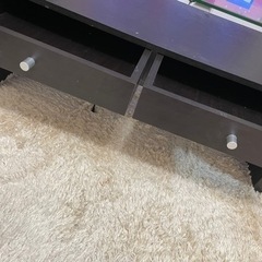引き出し付きガラステーブルの画像