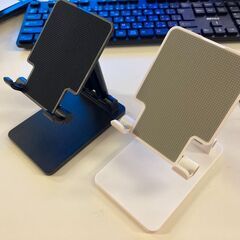 新品 タブレットスタンド スマホスタンド 白　黒　ホワイト　ブラック　角度調整可能 折り畳み式　卸し　転売OK　せどり　倒産品　激安　メルカリ　新品未使用の画像