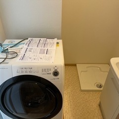 ドラム式洗濯機の持ち上げ設置 - 荒川区