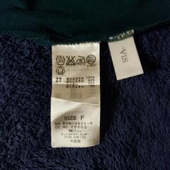 グリーンのブラウスの画像