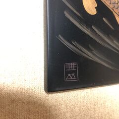 双鯉の漆額の画像