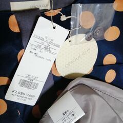 新品タグ付きワンピースの画像