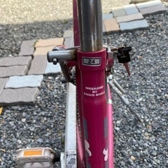 ピンク色　自転車の画像