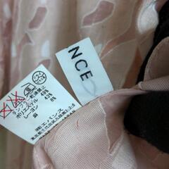 サーモンピンクのジャケットブラウスの画像