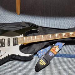 Ibanezのギターとストラップとケース