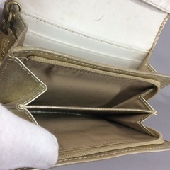 COACH コーチ ゴールドレザー×パッチワークシグネチャー L字ファスナー折財布 の画像