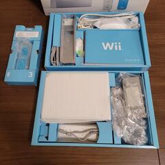 Wii本体 + ソフト(4本)の画像