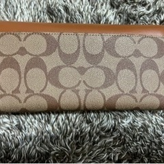 初回お値下げ♪正規品 ブラウン×ブラウンシグネチャー二つ折り財布の画像