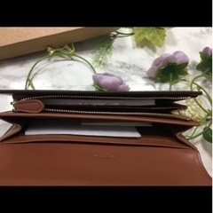 初回お値下げ♪正規品 ブラウン×ブラウンシグネチャー二つ折り財布の画像