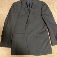 テイジンメンズショップギンザの黒スーツの画像