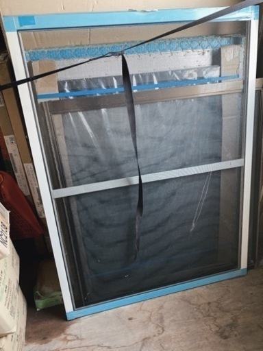 勝手口の扉、網戸。新品