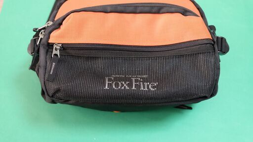 Fox Fire製カメラ2WAYバック オレンジ・ブラック